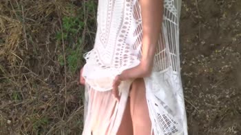 Gorgeous Brunette in Dress Undresses by River's Edge