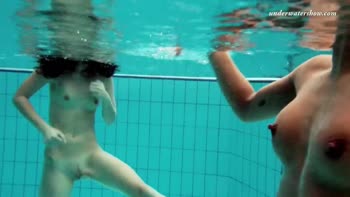 Russian Brunette Lesbians Sizzle Underwater
