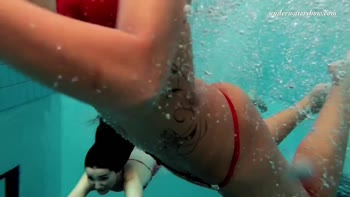 Russian Brunette Lesbians Sizzle Underwater
