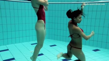 Russian Brunette Lesbians Sizzle Underwater