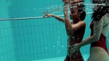 Russian Brunette Lesbians Sizzle Underwater