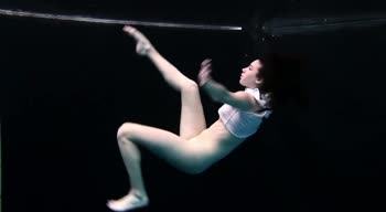 Dive into Naked Bliss: Stunning Girls Swim Underwater