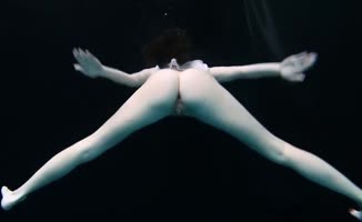 Dive into Naked Bliss: Stunning Girls Swim Underwater