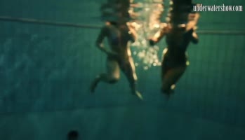 Dive into Naked Bliss: Stunning Girls Swim Underwater