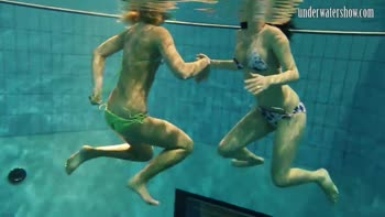 Dive into Naked Bliss: Stunning Girls Swim Underwater