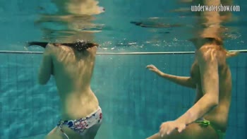 Dive into Naked Bliss: Stunning Girls Swim Underwater