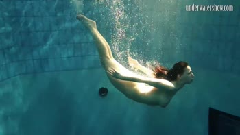 Dive into Naked Bliss: Stunning Girls Swim Underwater