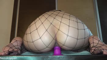 Nezukojapan's Squirting Bliss in Fishnet Stockings