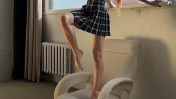HollyHarlot's Giantess Feet Tease: Skinny Goddess in Mini Skirt