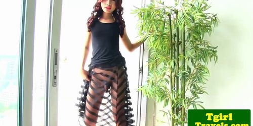 Redhead Ladyboy's Tight Ass Teased by Dildo Delight