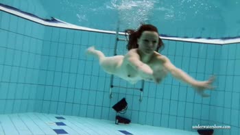 Kristy's Underwater Seduction: A Sizzling Swimming L Girl Experience