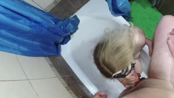 Blonde Bombshell Fashionable Promiscuity Sucks in Shower POV