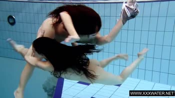 Aneta's Underwater Lesbians: Shaved Brunette Seduction