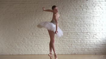 Balletic Bliss: Russian Blonde Ballerina Undresses for a Stunning Solo