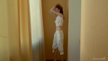 Blue's Sensual Striptease Unfolds Her Stunning 18-Year-Old Body