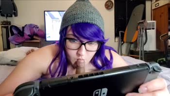 Free use slut loves keeping a cock warm in her mouth playing video games.