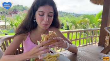Cute Girl Eating Burger with Cum on Her Face in Public Cafe
