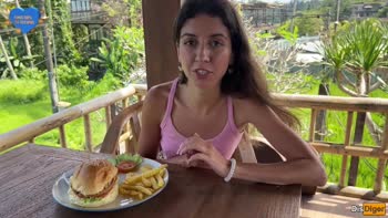Cute Girl Eating Burger with Cum on Her Face in Public Cafe