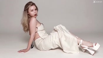 Sultry Seduction: A Blonde Beauty's Solo Strip