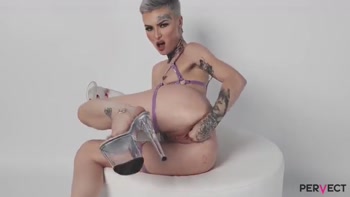 Tabitha Poison Fucks All of Her Holes with a Huge Transparent Dildo!