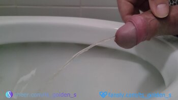 TSgoldenS's Morning Deluge: Golden Shower Handjob Fun