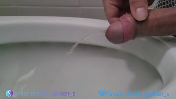 TSgoldenS's Morning Deluge: Golden Shower Handjob Fun