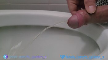 TSgoldenS's Morning Deluge: Golden Shower Handjob Fun
