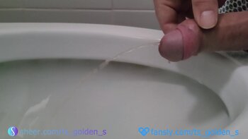 TSgoldenS's Morning Deluge: Golden Shower Handjob Fun