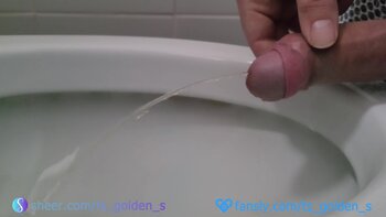 TSgoldenS's Morning Deluge: Golden Shower Handjob Fun