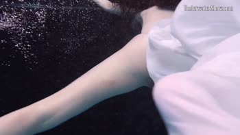 Dress Sizzles in Underwater Seduction