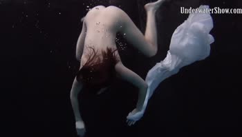Dress Sizzles in Underwater Seduction