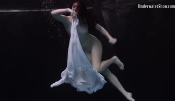 Dress Sizzles in Underwater Seduction