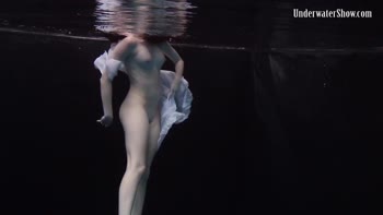 Dress Sizzles in Underwater Seduction