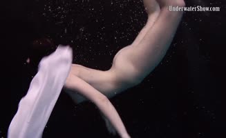 Dress Sizzles in Underwater Seduction