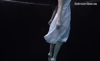 Dress Sizzles in Underwater Seduction