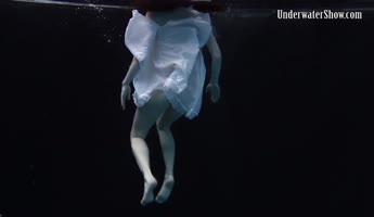 Dress Sizzles in Underwater Seduction
