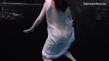 Dress Sizzles in Underwater Seduction