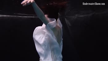 Dress Sizzles in Underwater Seduction
