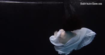 Dress Sizzles in Underwater Seduction