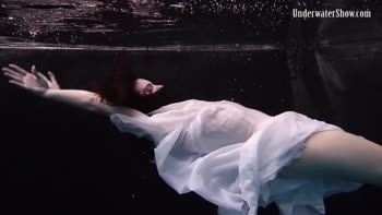 Dress Sizzles in Underwater Seduction