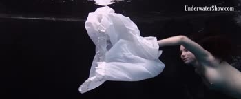 Dress Sizzles in Underwater Seduction