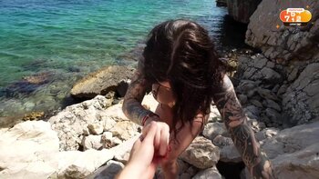 Nikky Dandeli's Sizzling Beach Fling: Tattooed Temptress Takes on the Sun