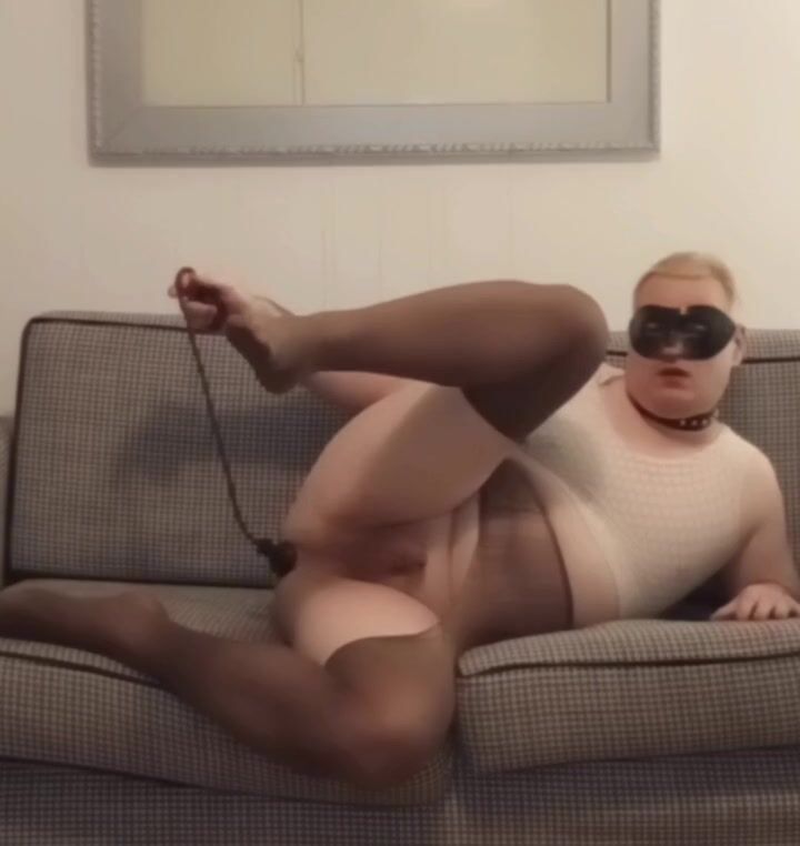 Sissy CD in pantyhose taking dildo in ass