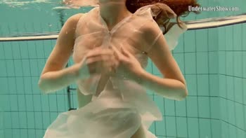 Russian Babes Take the Plunge in an Underwater Seduction