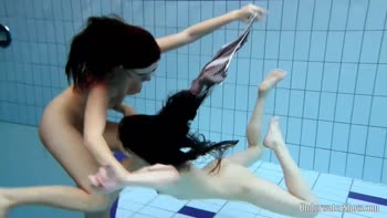 Russian Babes Take the Plunge in an Underwater Seduction