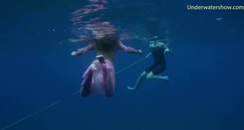 Russian Petites Dive into XXXWater: Underwater Show in Tenerife
