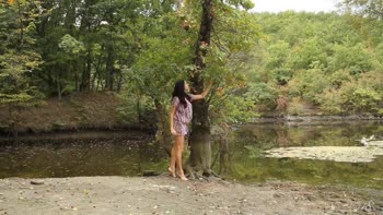 Nature's Seduction: Big-Busted Cutie Spends Solo Time in Woods