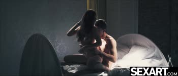 Busty Brunette MILF Seduces in Sensual Cowgirl Position