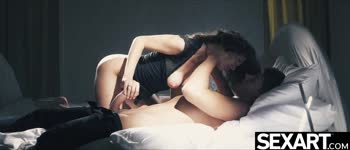 Busty Brunette MILF Seduces in Sensual Cowgirl Position