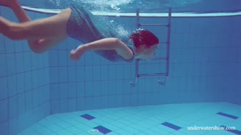 Sultry Teen (18+) Brunette Stuns in Underwater Solo Expose